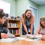 Micanopy Academy Photo #2 - Mrs. Smith working with a small group of ELA students